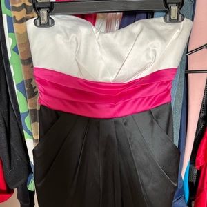 Black, Pink and Cream/White short formal dress with back tie and pockets.